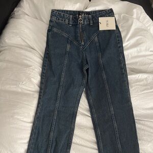 High Rise Blue Jeans by [Brand]